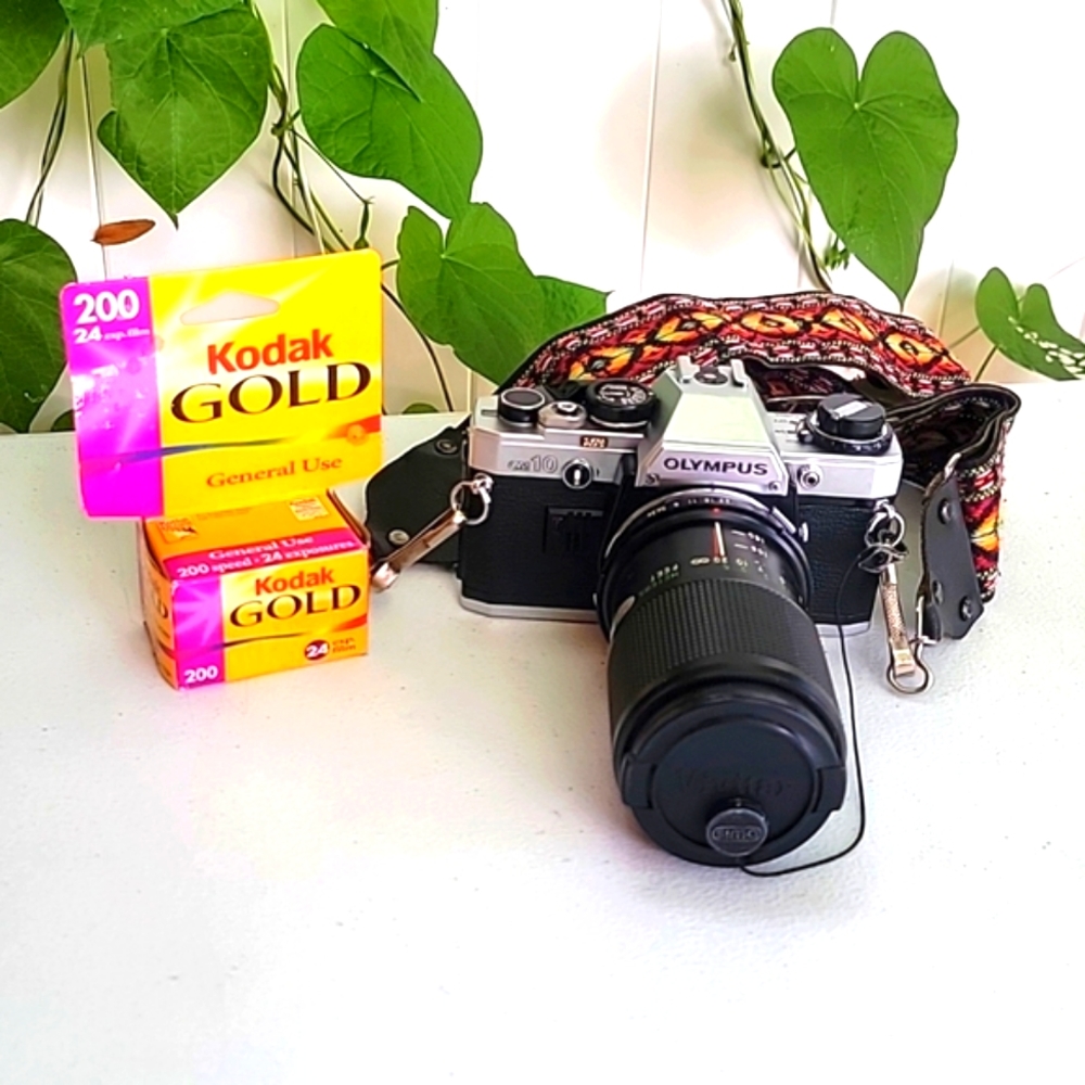 Vintage OLYMPUS OM10 Manual SLR Camera with Vivitar 70-150mm macro focusing zoom